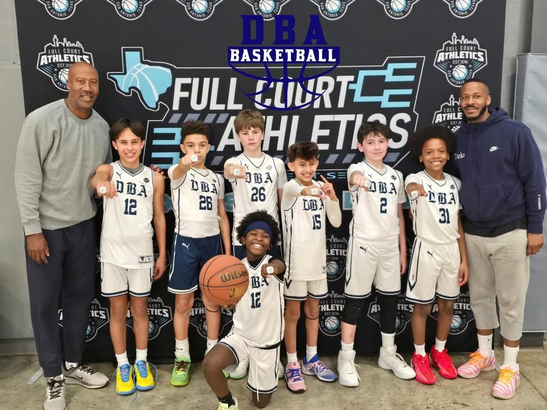 DBA Blue Devils team with coaches